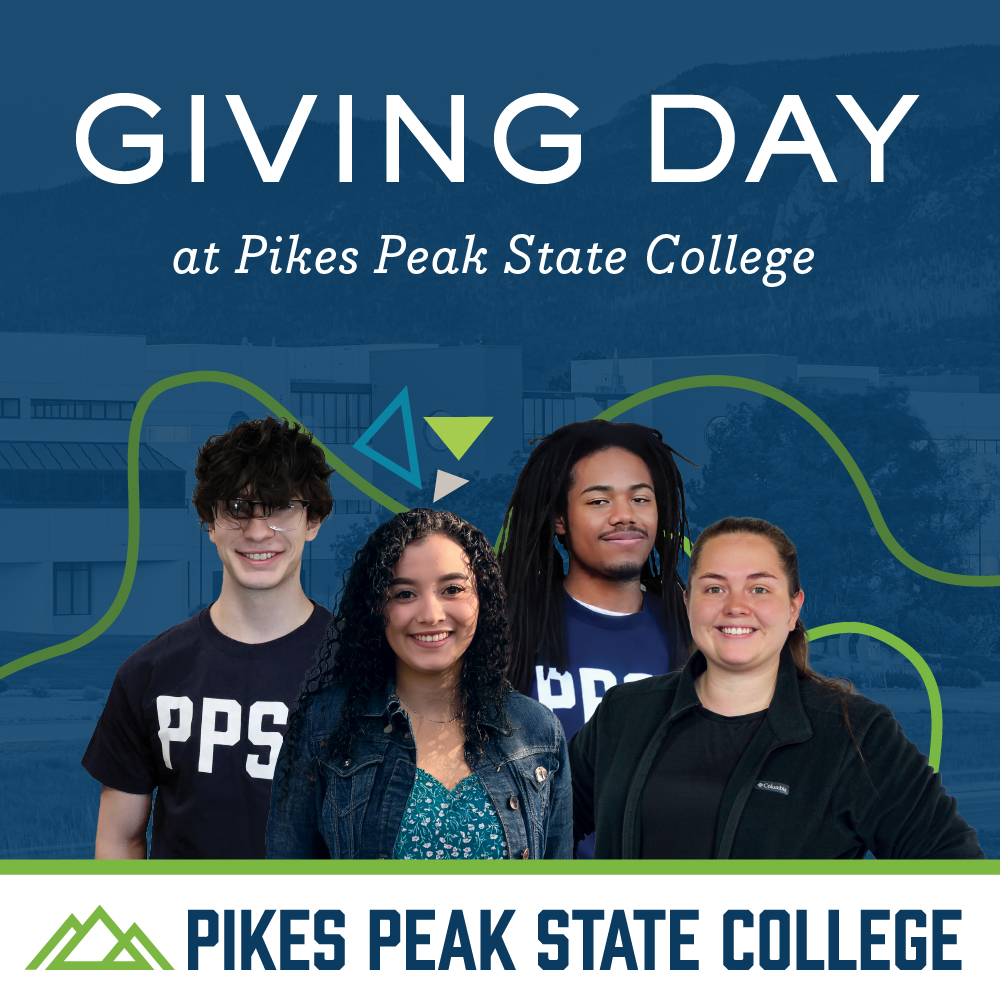 four students in front of logo