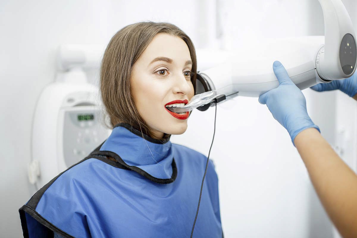 student working on dental model