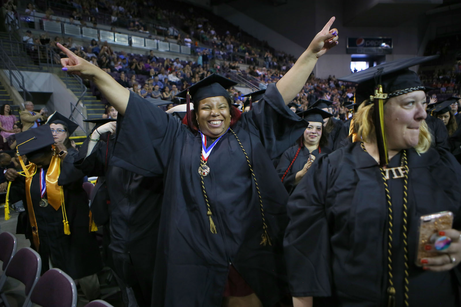 military student celebrating at commencement 