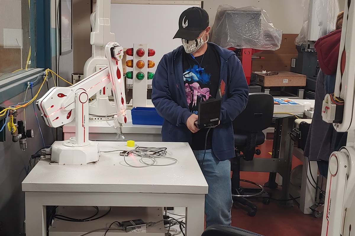 student controlling robot
