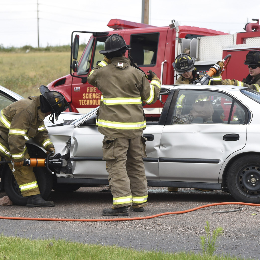 Fire Cadet putting out fire