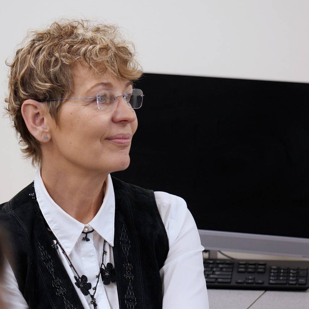 An instructor writing on a whiteboard