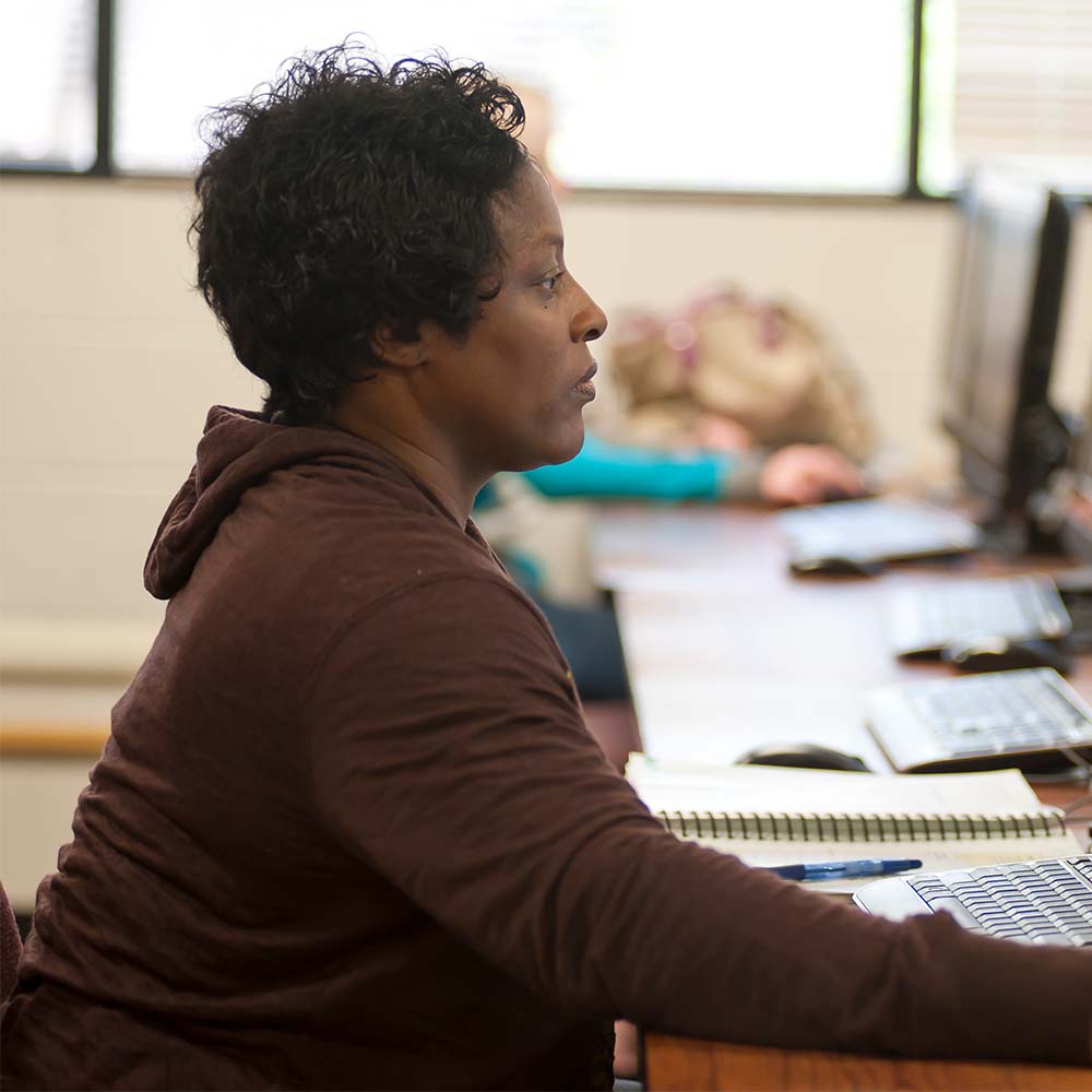student on computer