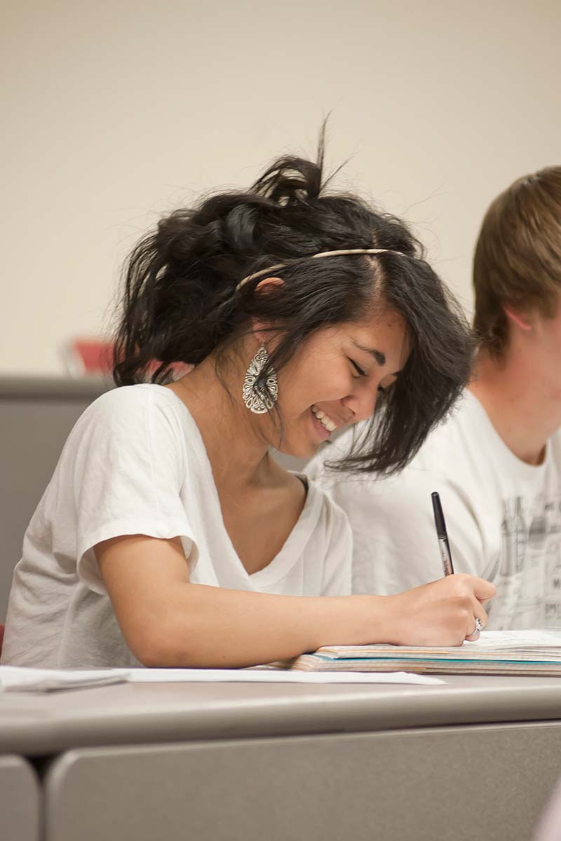 Girl studying in class