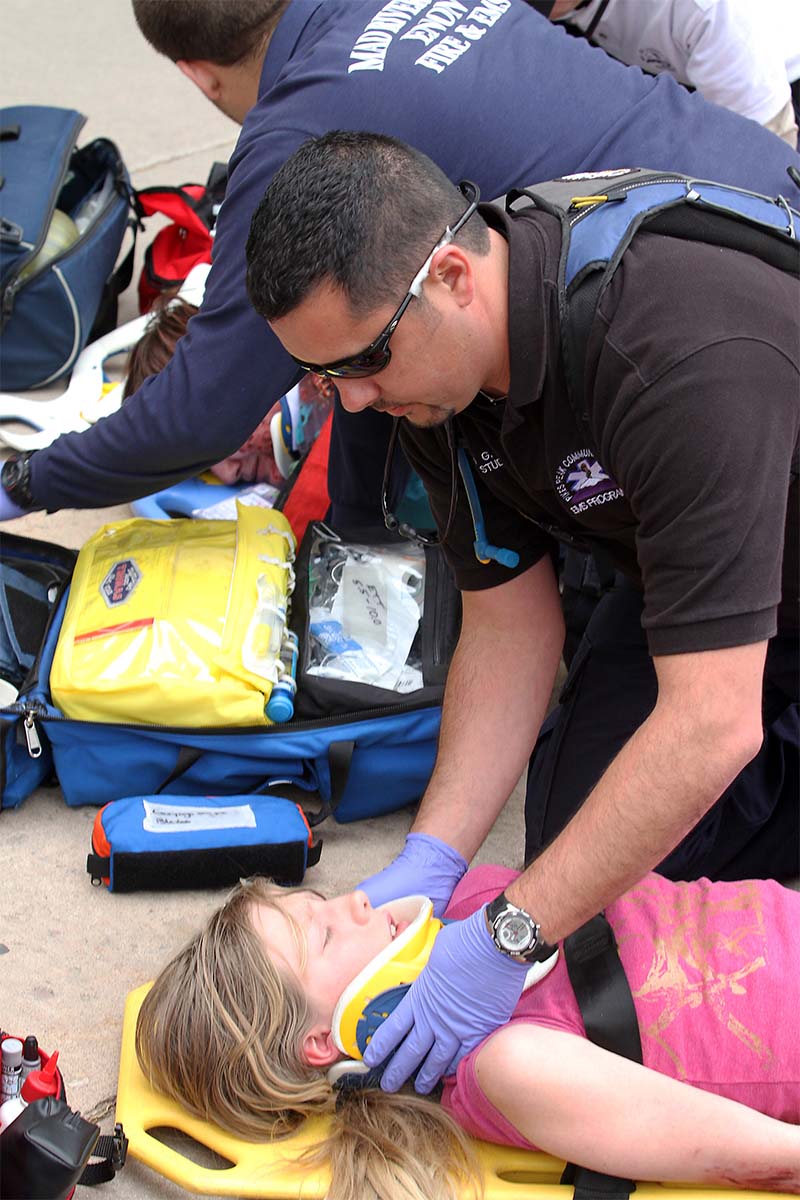 paramedic tending to a patient