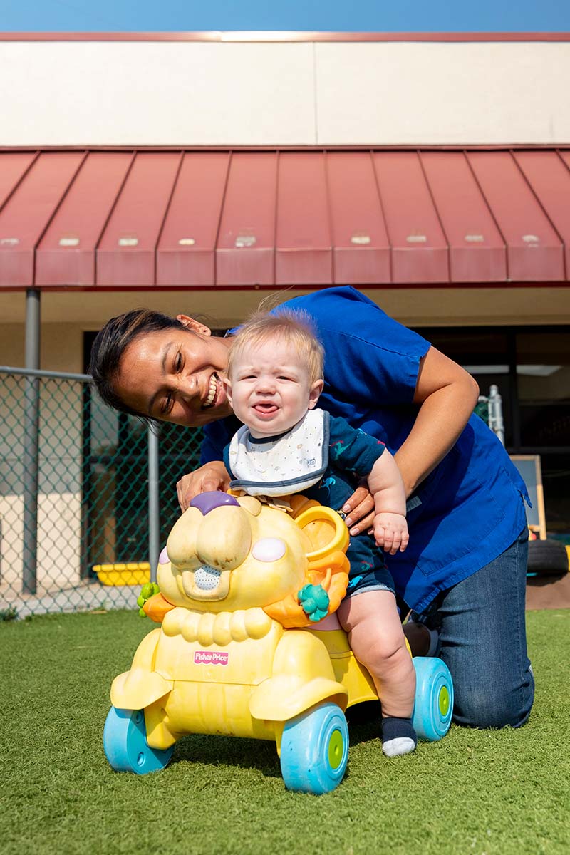 Caretaker playing with child 