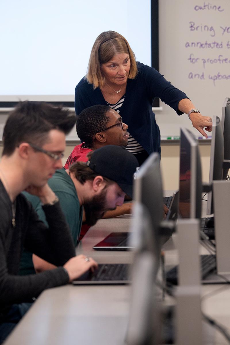 PPCC Professor helping student in class