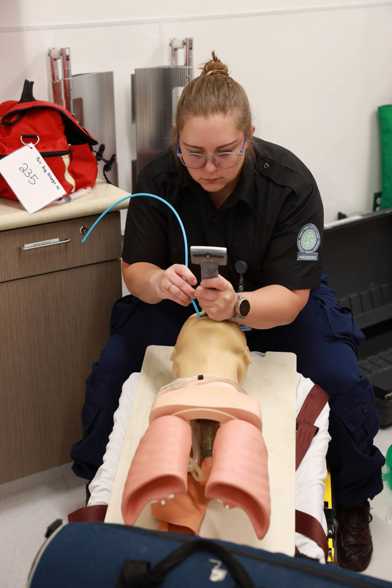 EMT student practicing skills during class