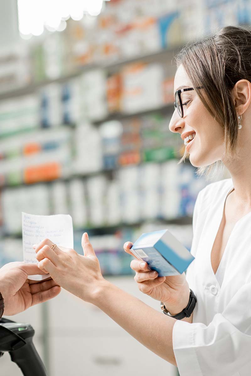 pharmacy tech helping a customer