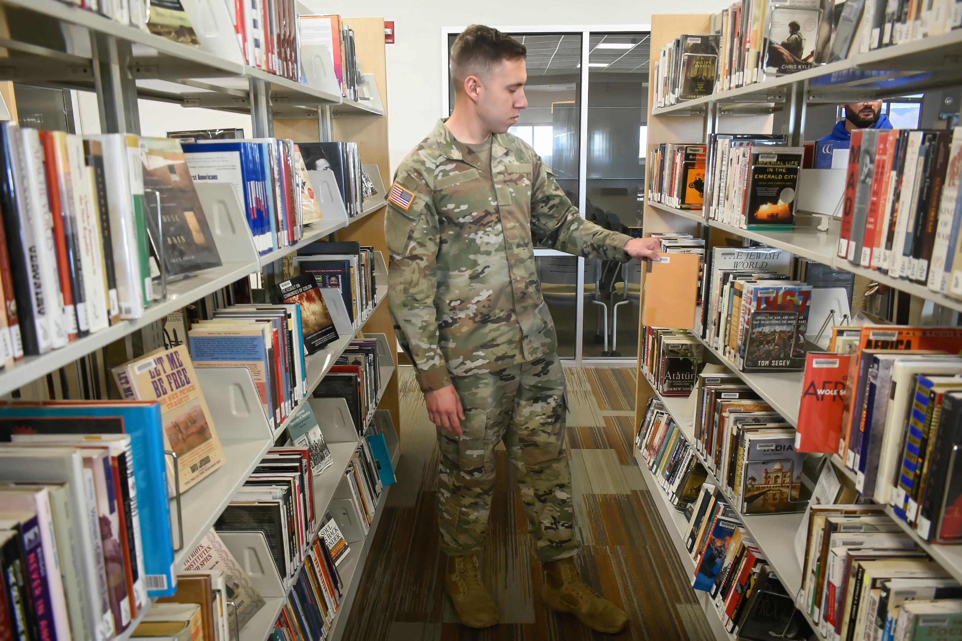Active Duty Army Student in the library