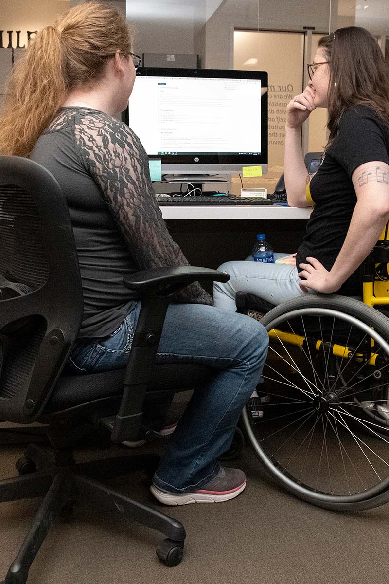 Two TRIO Students Looking at a Computer